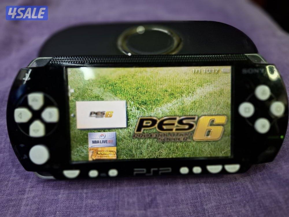 PSP SONY P1000 MODEL.BLACK& WHITE COLOR 8GB SD CARD 50GAMES4