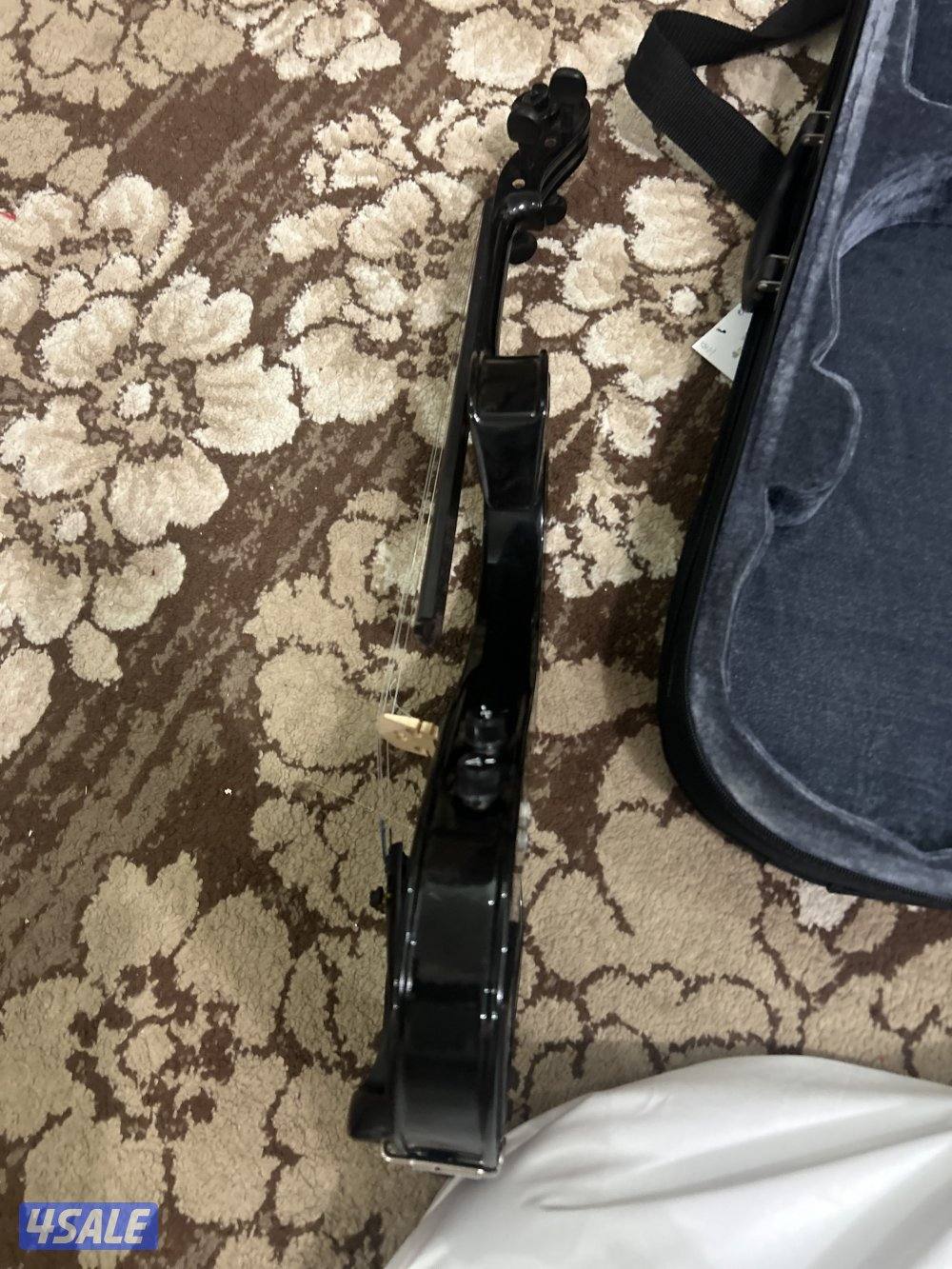 كمان كهربائي نظيف ومع اغراضه2