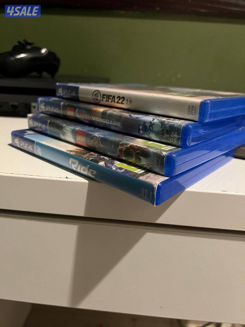 playstaion 4 pro with a controller in good condition with games1