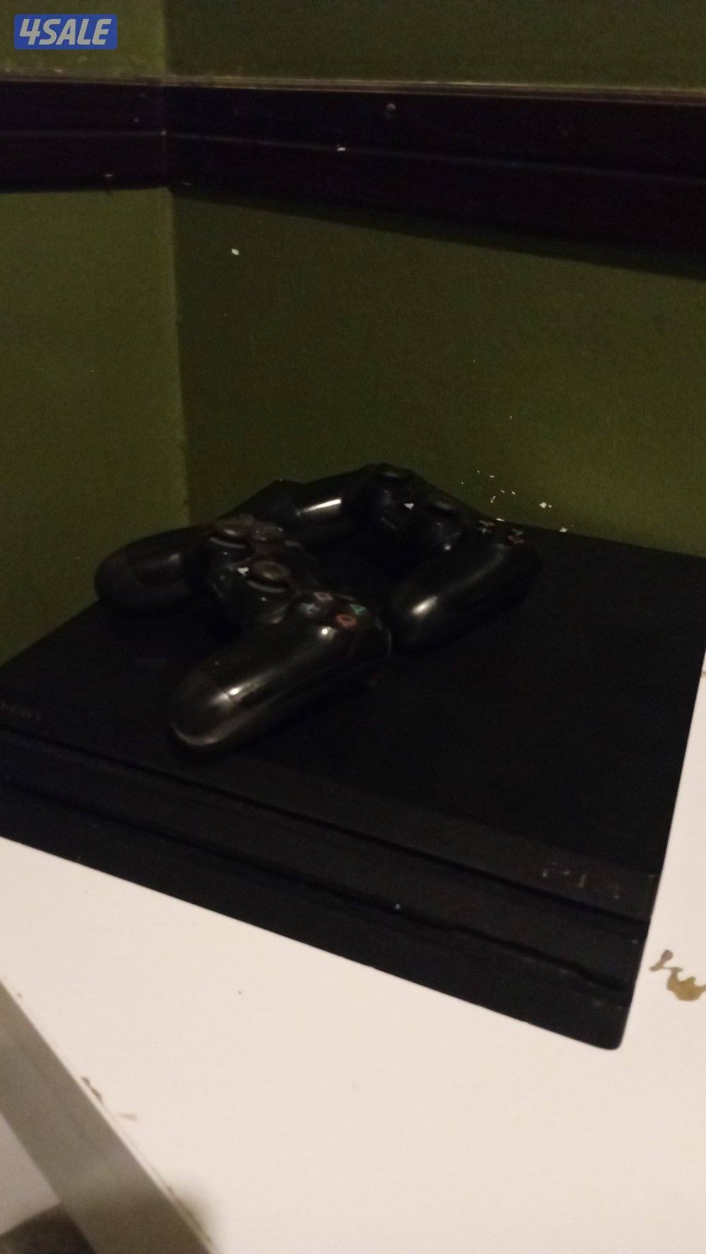playstaion 4 pro with a controller in good condition with games3