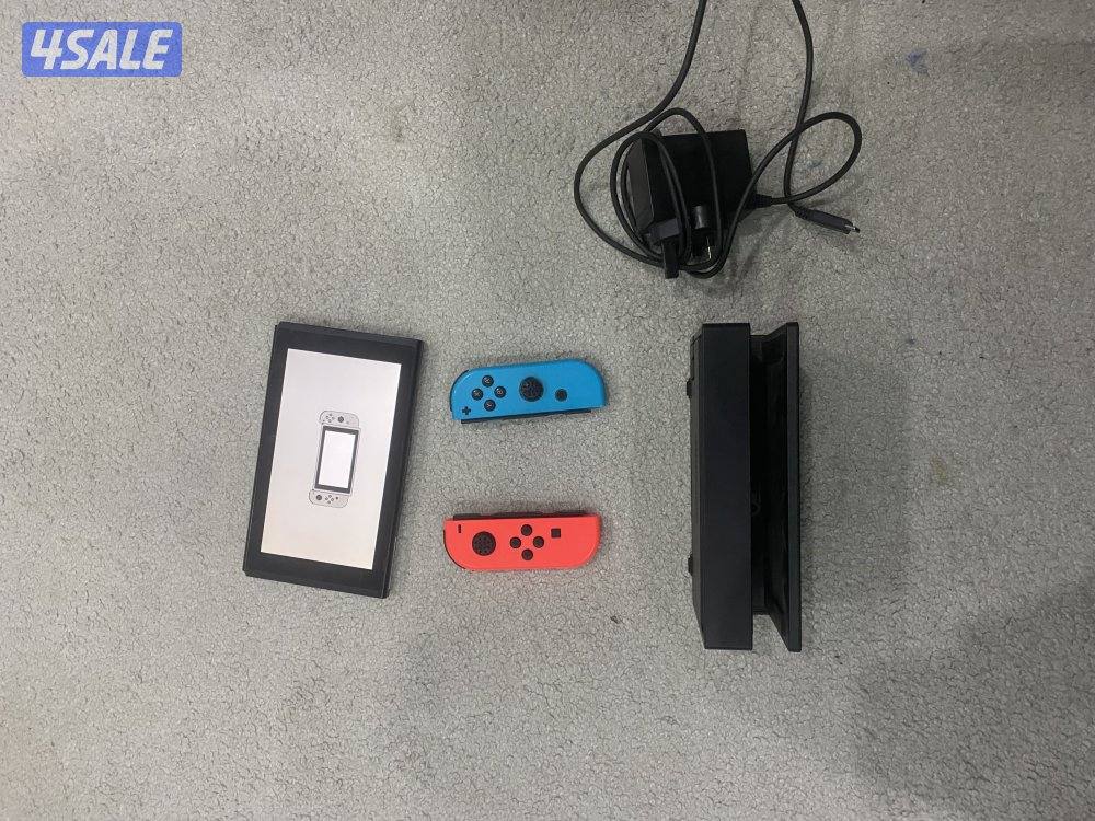 Nintendo switch with original charger and dock3