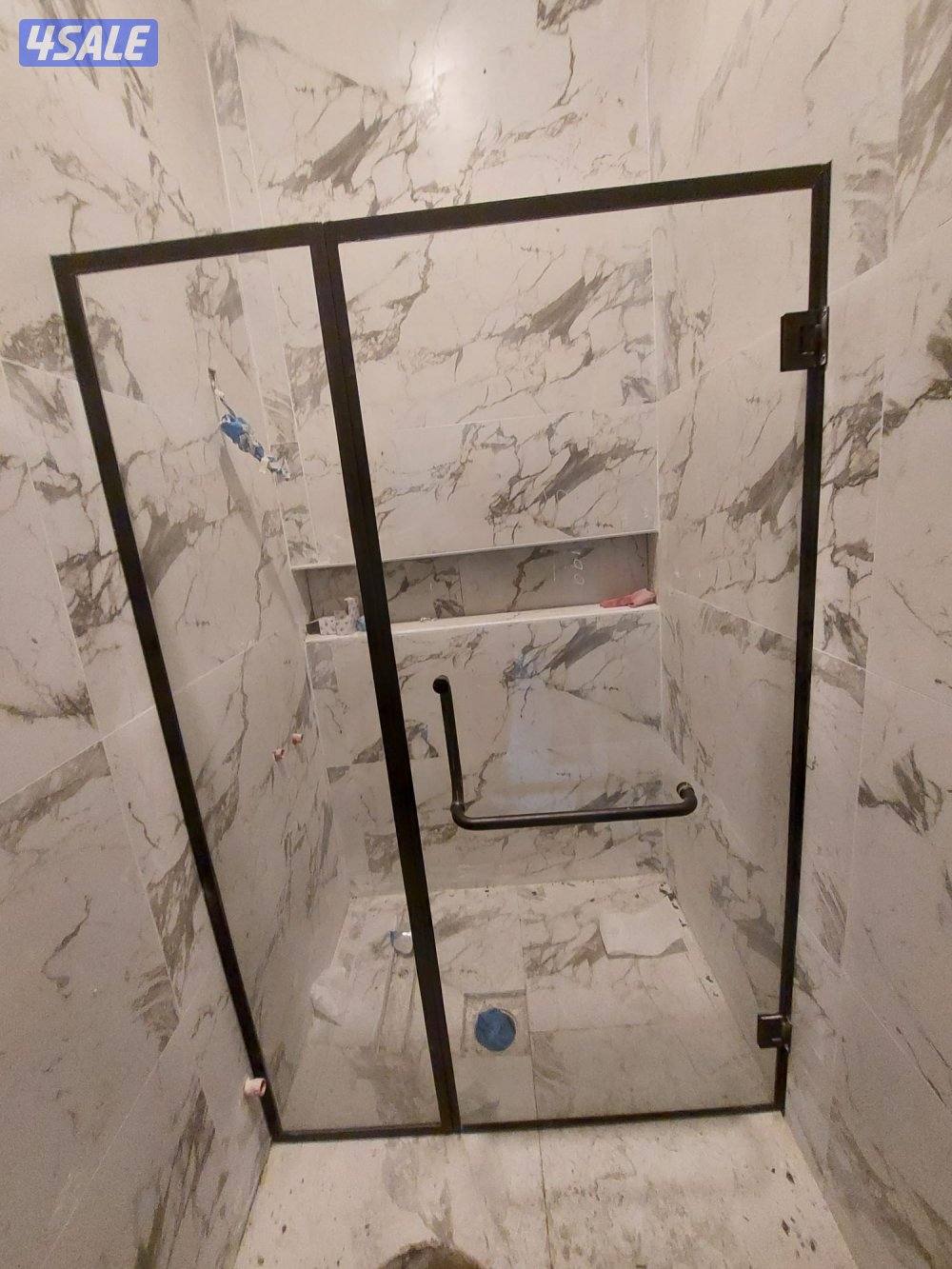 فني زجاج ومرايا وشاور بكس وطاولات طعام وتركيب جميع انواع الزجاج2