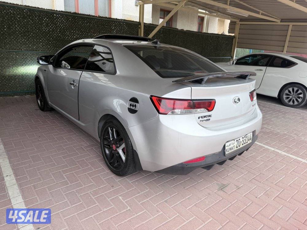 Kia koup full option  2000-cc   -كيا سيراتو كوبيه وكاله ممشي قليل 20121