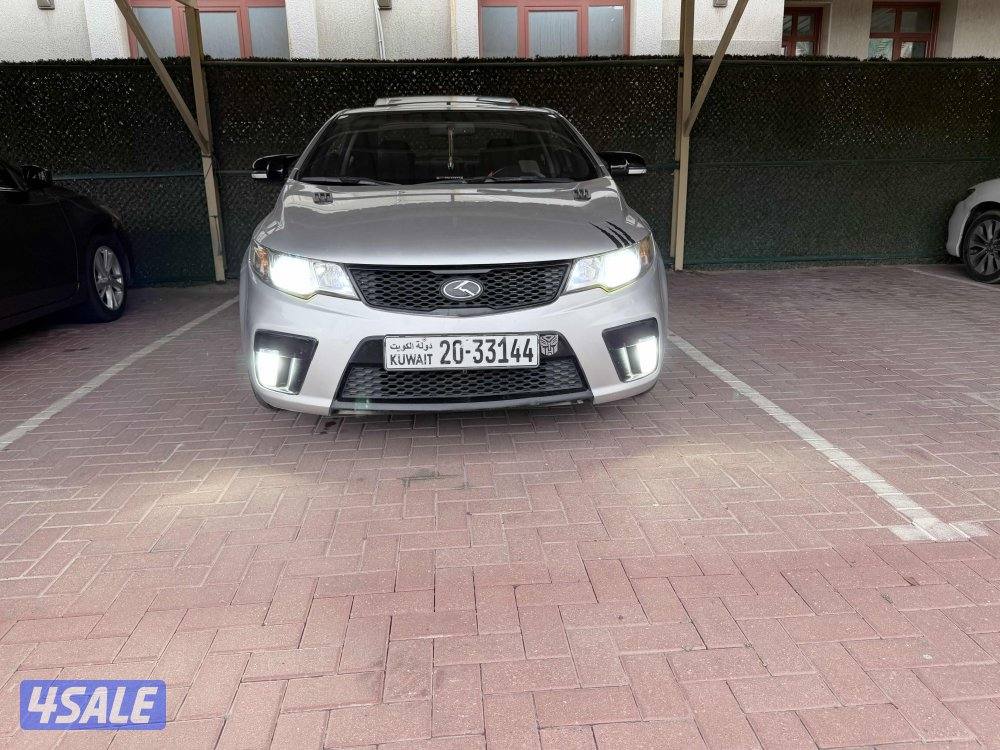 Kia koup full option  2000-cc   -كيا سيراتو كوبيه وكاله ممشي قليل 20127
