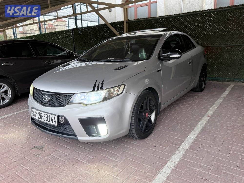 Kia koup full option  2000-cc   -كيا سيراتو كوبيه وكاله ممشي قليل 20128