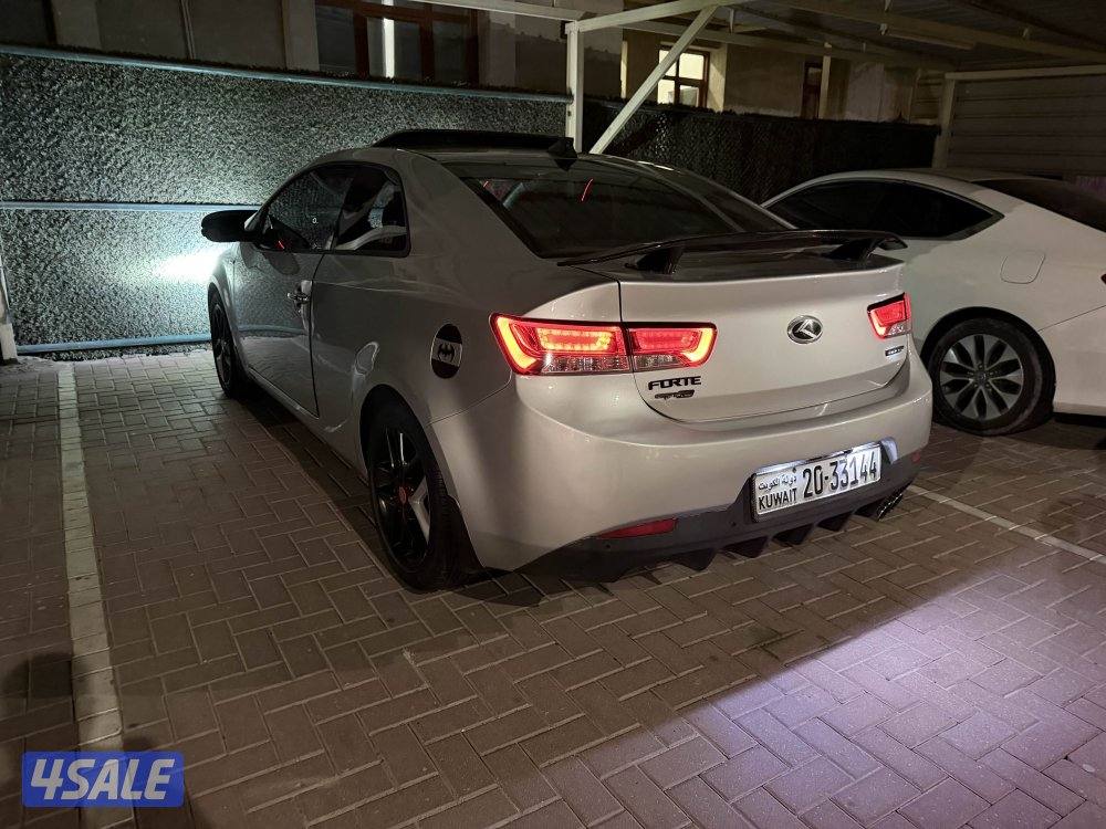 Kia koup full option  2000-cc   -كيا سيراتو كوبيه وكاله ممشي قليل 201214