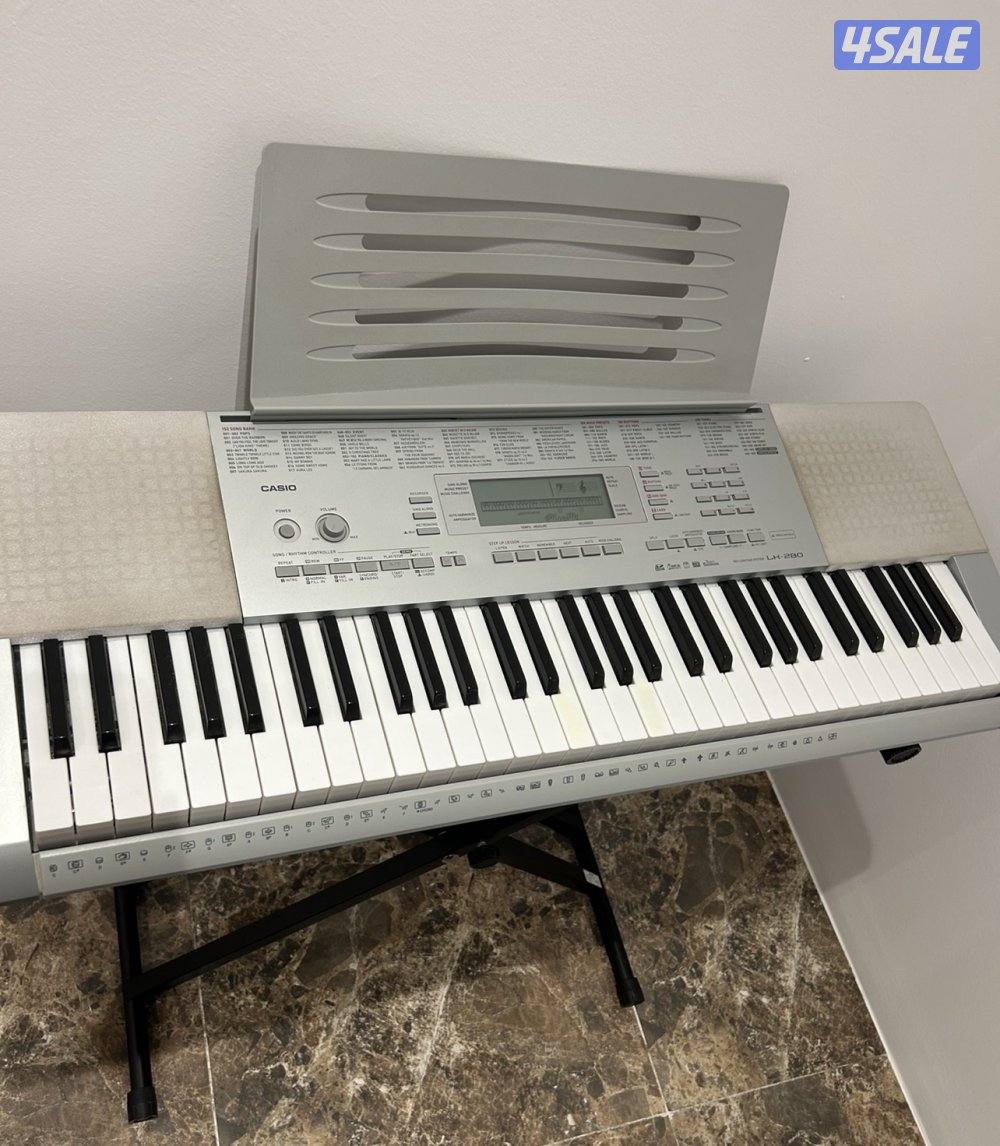 بيانو كاسيو مع مايك و ستاند في حاله ممتازه1