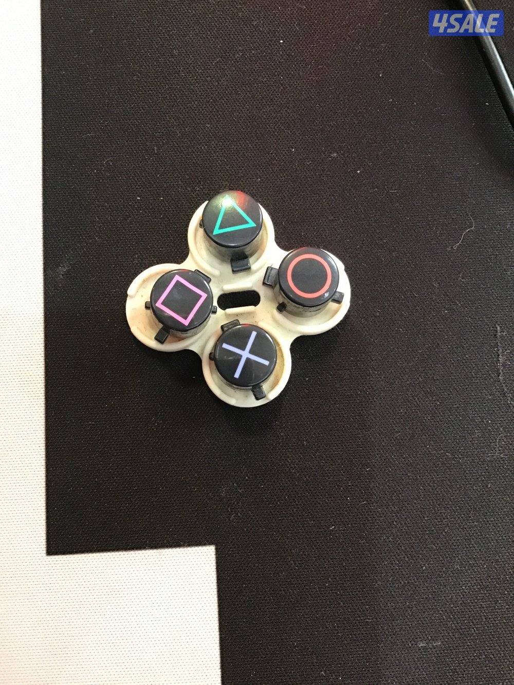 أزرار. يد بلاستيشن ثلاثة1