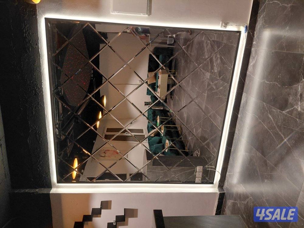 تركيب جميع اعمال الزجاج  شاور بوكس _دربزين _واجهات زجاج_ مرايا_ قواطع1