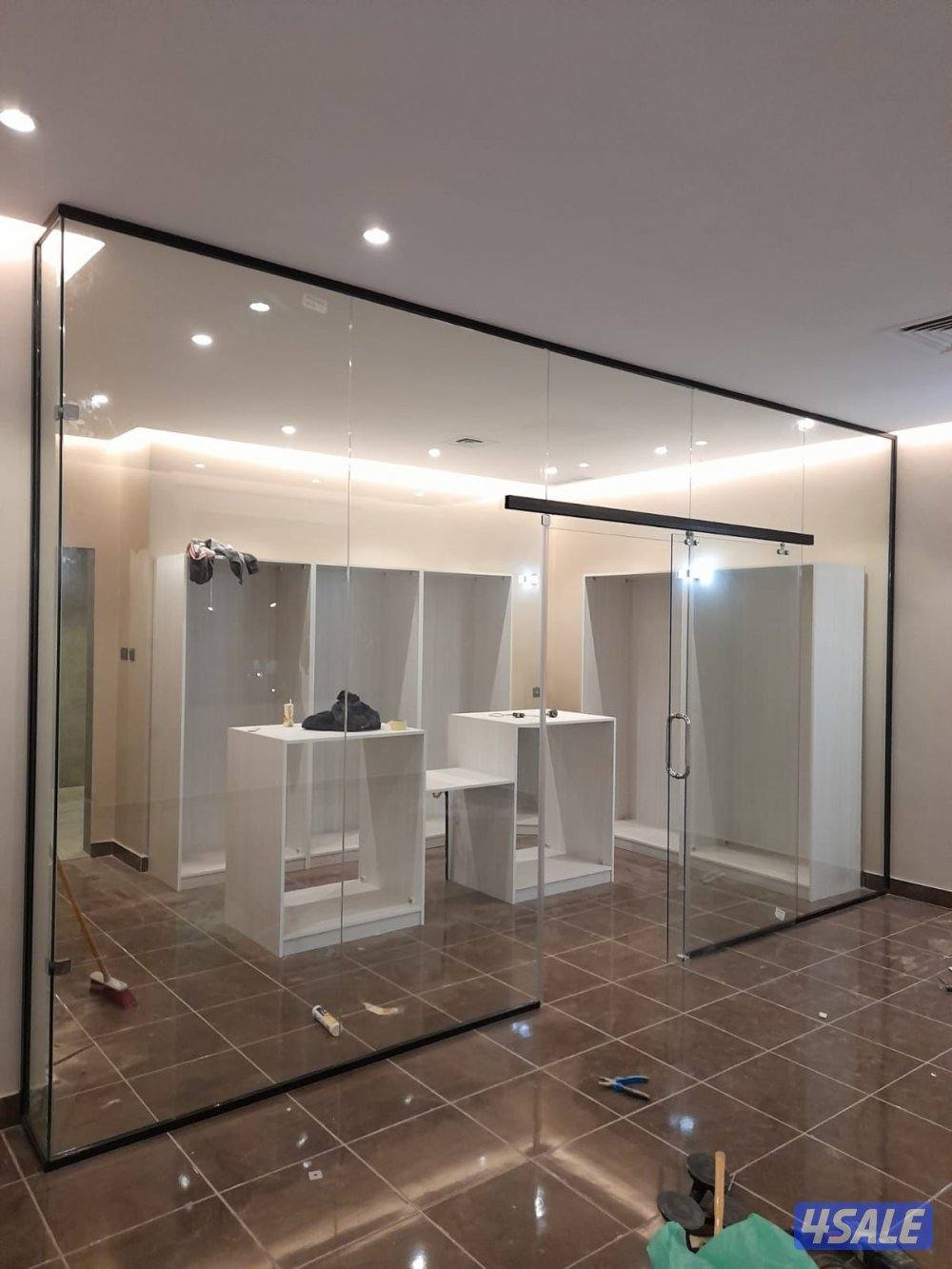 تركيب جميع اعمال الزجاج  شاور بوكس _دربزين _واجهات زجاج_ مرايا_ قواطع2