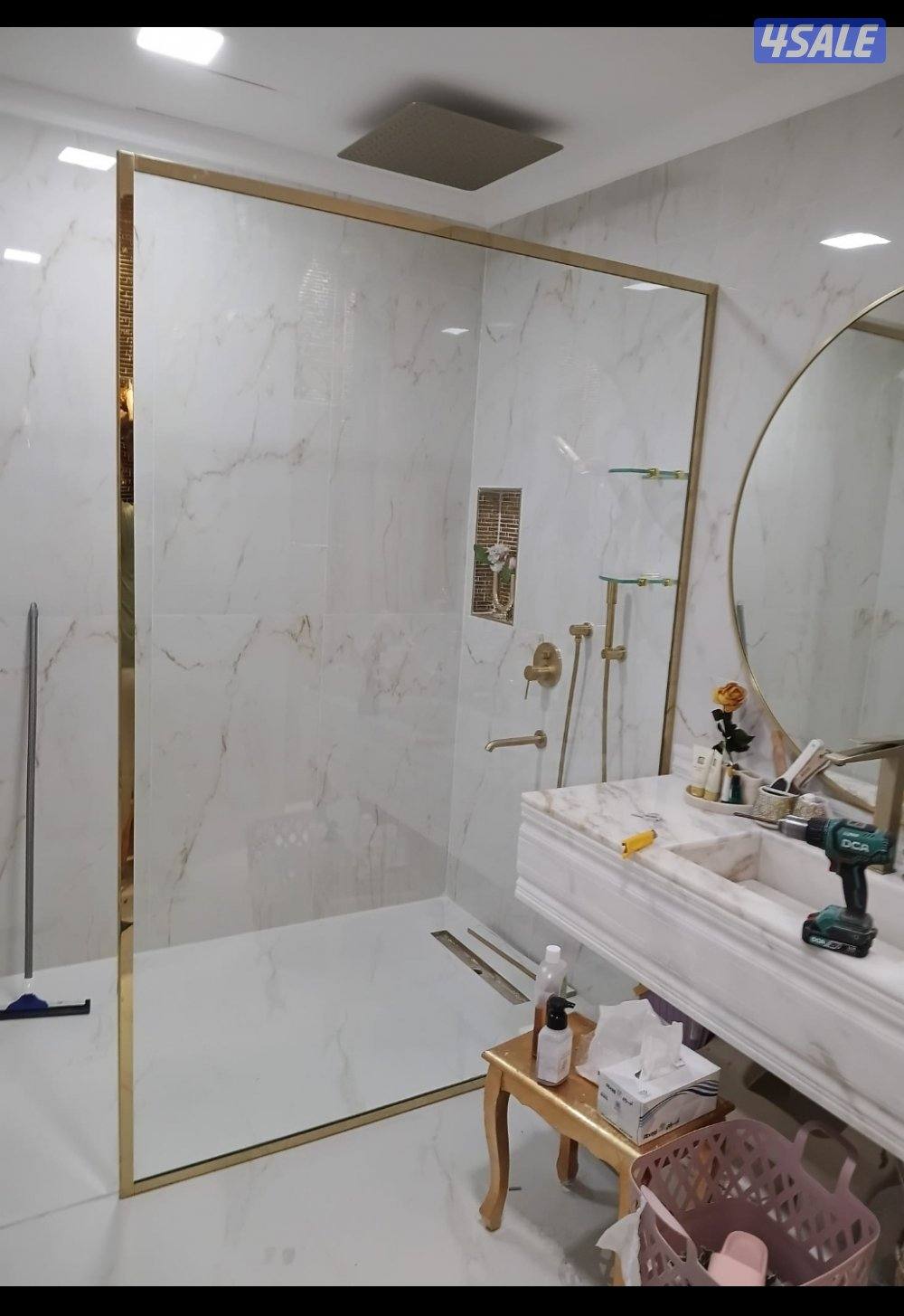 تركيب جميع اعمال الزجاج  شاور بوكس _دربزين _واجهات زجاج_ مرايا_ قواطع3