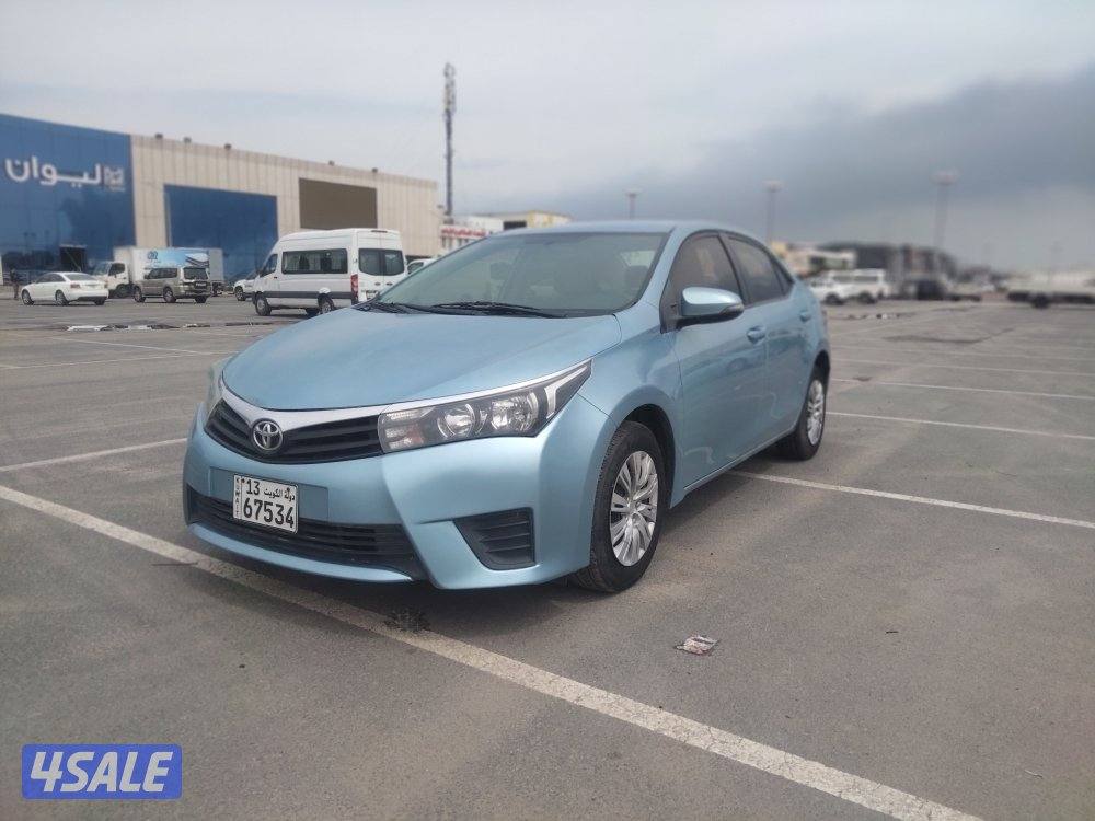 تويوتا كورولا 1.6 موديل 2015 لون ازرق بحري عداد ٢٦٣ الف بحاله ممتازة1