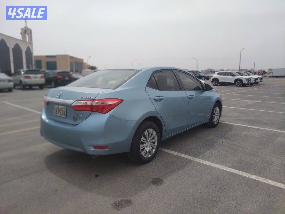 تويوتا كورولا 1.6 موديل 2015 لون ازرق بحري عداد ٢٦٣ الف بحاله ممتازة3