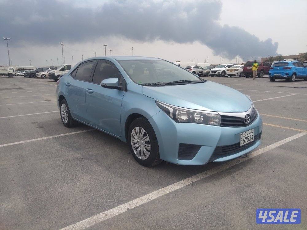 تويوتا كورولا 1.6 موديل 2015 لون ازرق بحري عداد ٢٦٣ الف بحاله ممتازة2