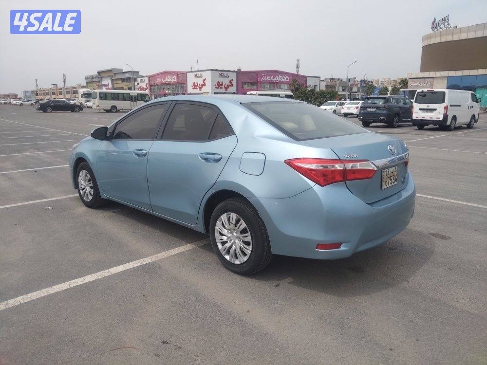 تويوتا كورولا 1.6 موديل 2015 لون ازرق بحري عداد ٢٦٣ الف بحاله ممتازة4