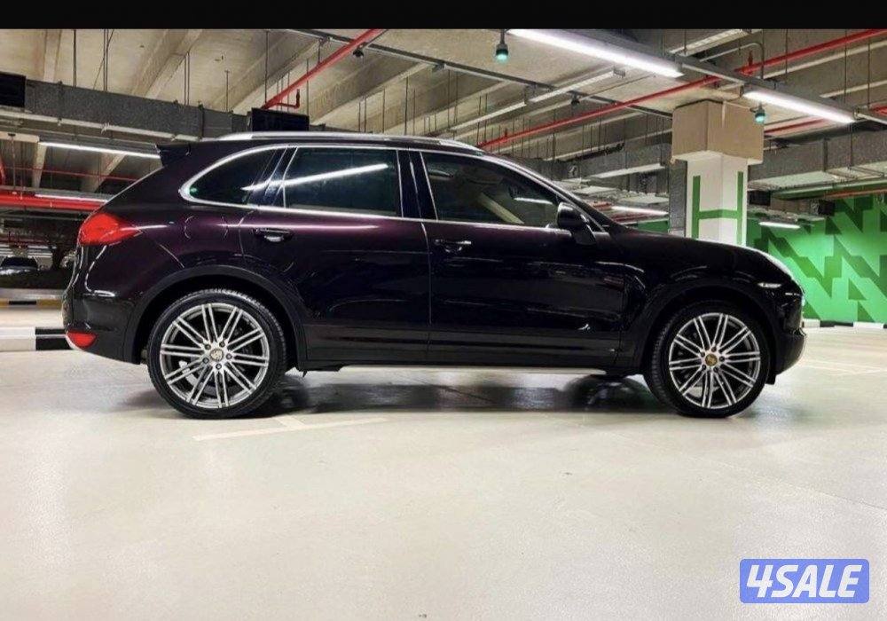 للبيع جيب بورش كايين  6  سلندر  موديل 2012  اللون الخارجي بنفسجي غامق0