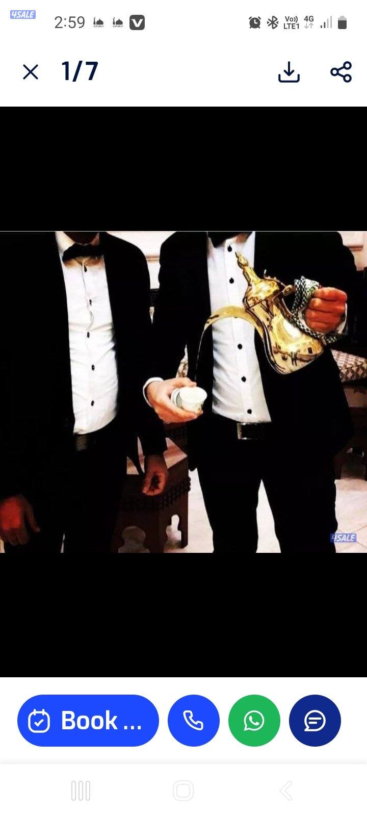 تقديم التمور والقهوة العربي بالزي الرسمي2