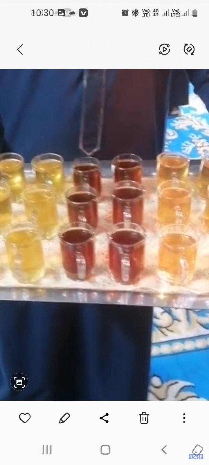 تقديم التمور والقهوة العربي بالزي الرسمي5