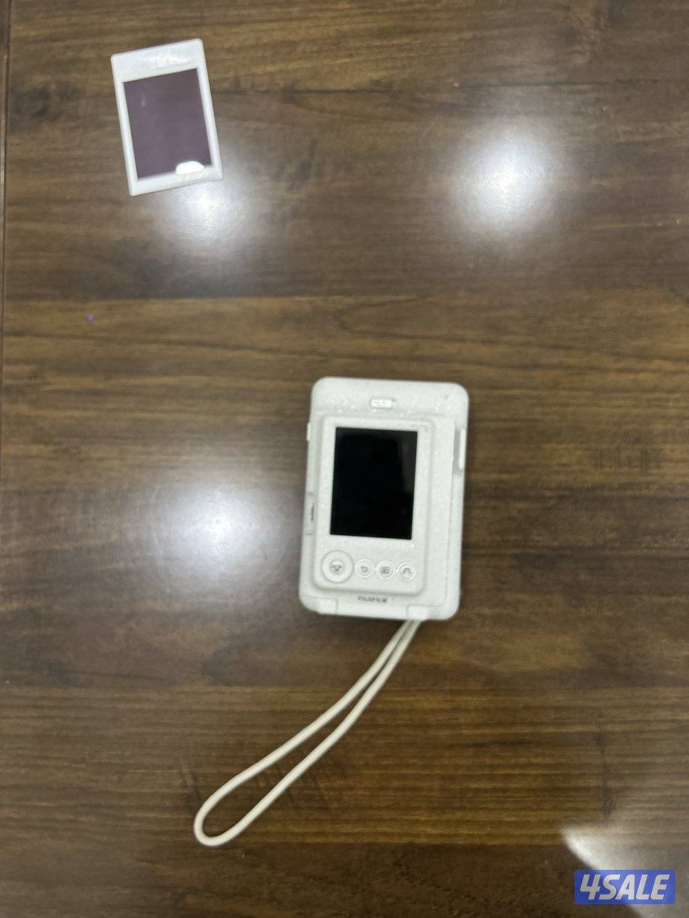 كامرة  instax سريعة التصوير جودة استعمال جدا خفيف تطبع الصور1