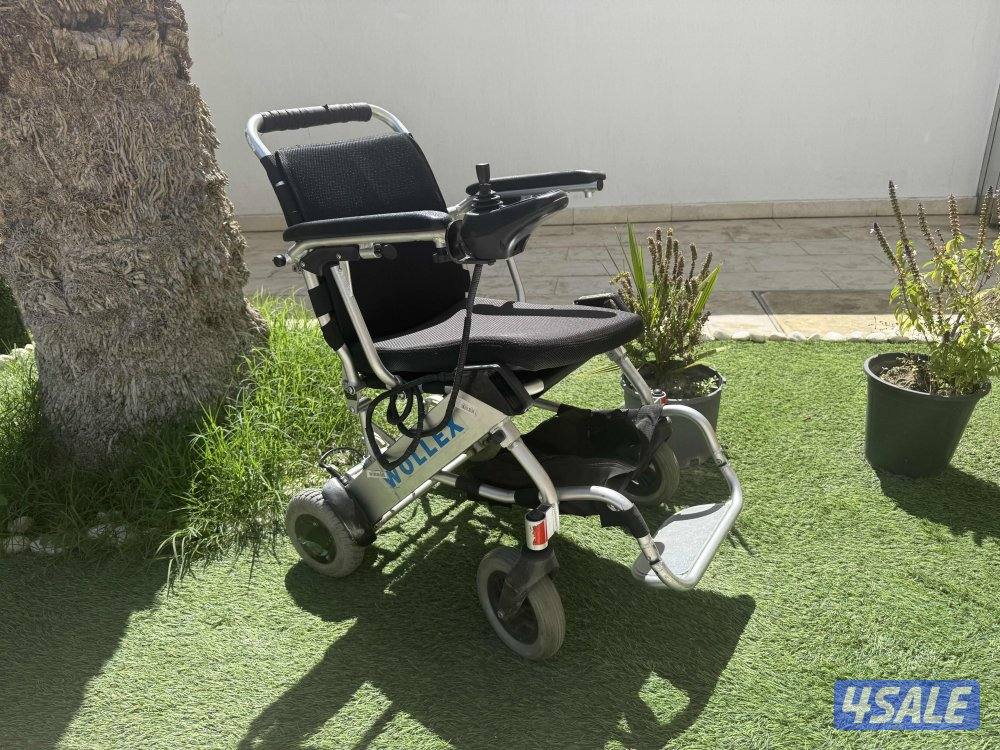 كرسي كهربائي متحرك لذوي الاحتياجات الخاصه7