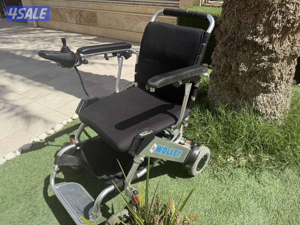 كرسي كهربائي متحرك لذوي الاحتياجات الخاصه11