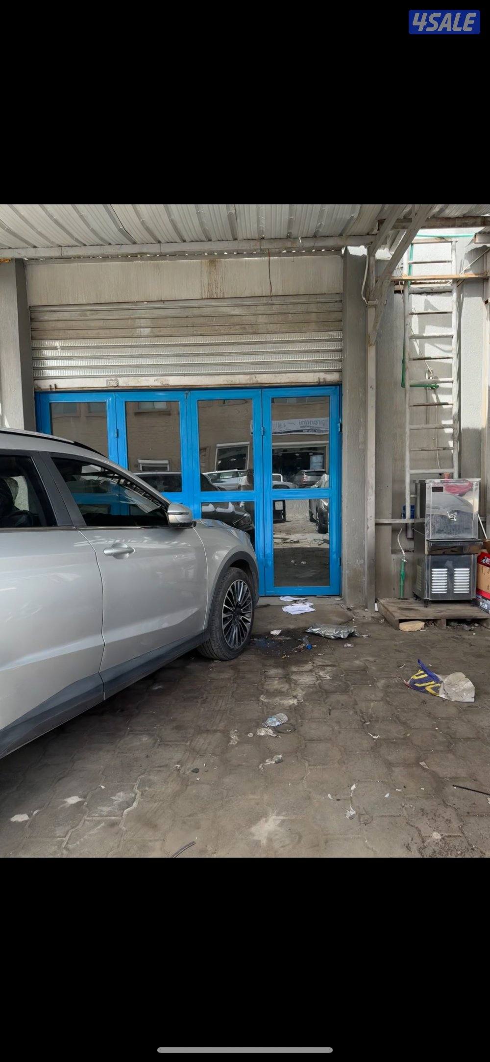 الشويخ الصناعيه  محل ٥٠ متر وسندره٢٥ متر شهر فري0