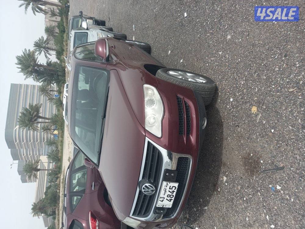 طوارق 2009 ماشي 98 الف فقط بحاله ممتازه1