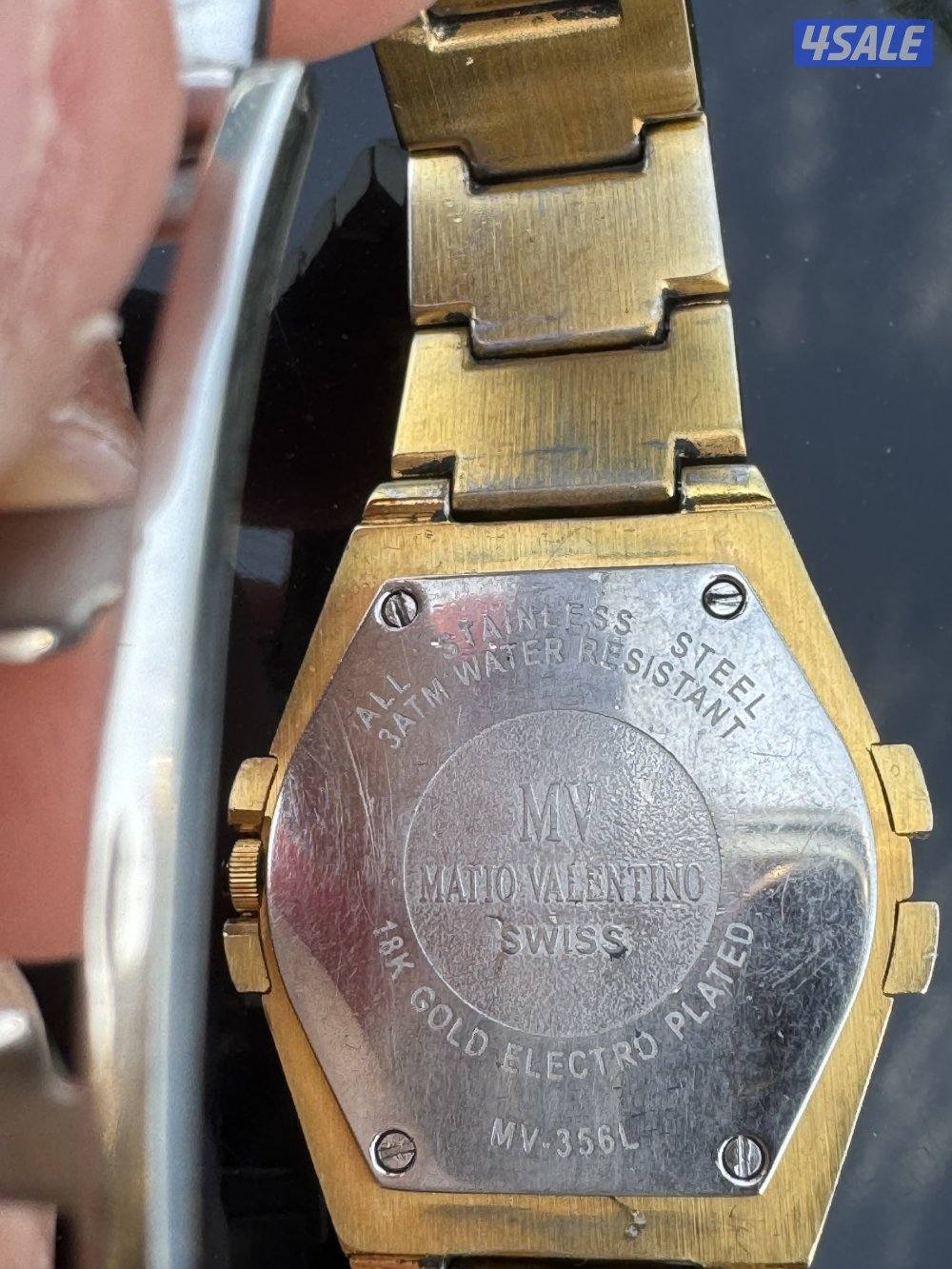 ساعة MV swiss مطلية ذهب 18k والميناء صدف0