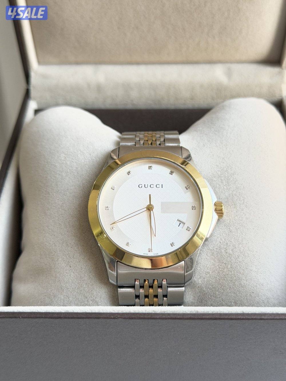 ساعة قوتشي الاصلية0