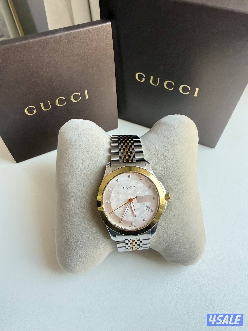 ساعة قوتشي الاصلية1