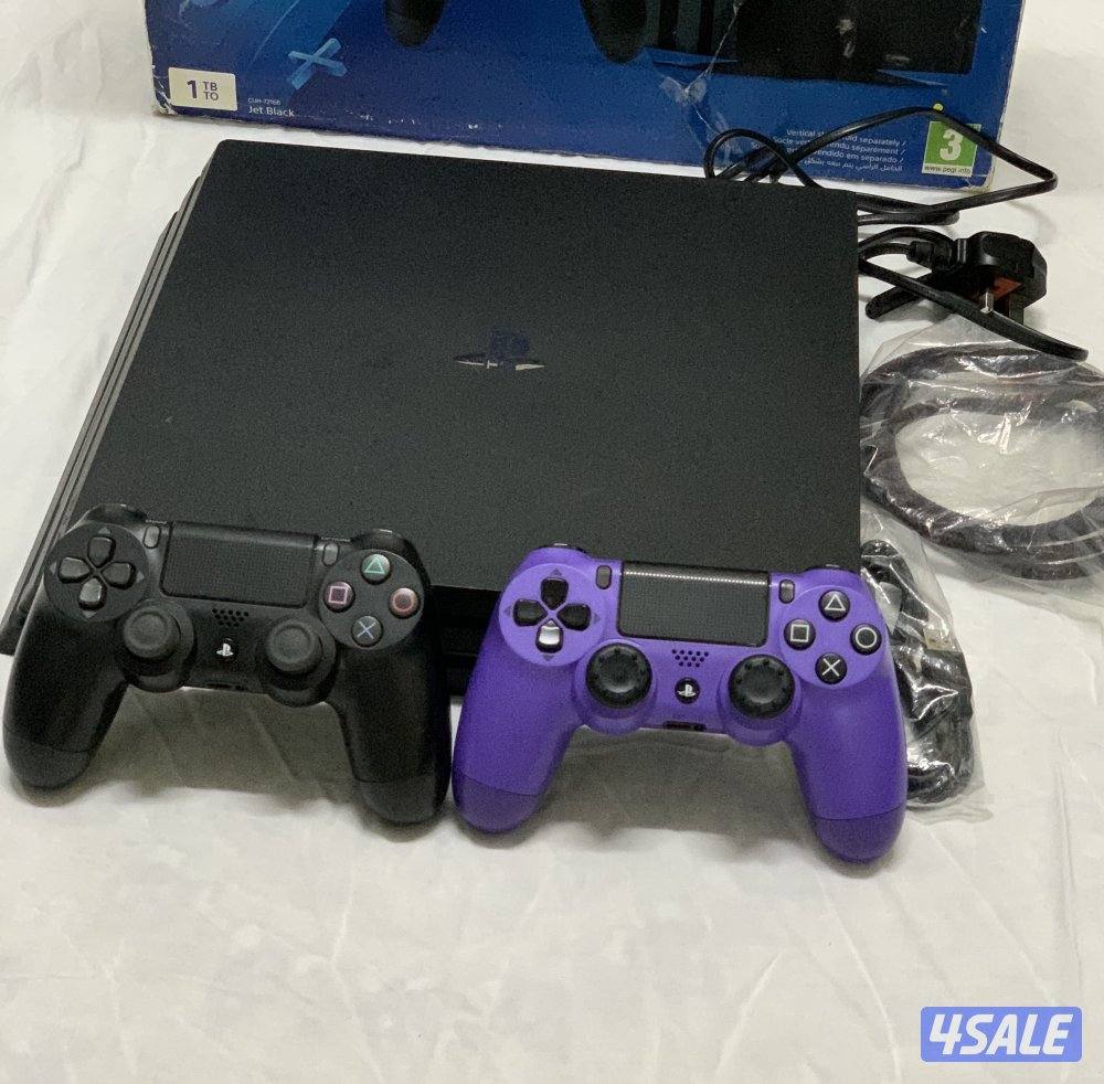 PS4 Pro 1TB + 2 Controllers + Box + 2 thumb grips ( Negotiable )0