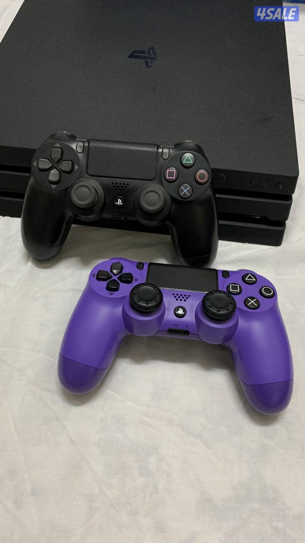 PS4 Pro 1TB + 2 Controllers + Box + 2 thumb grips ( Negotiable )1