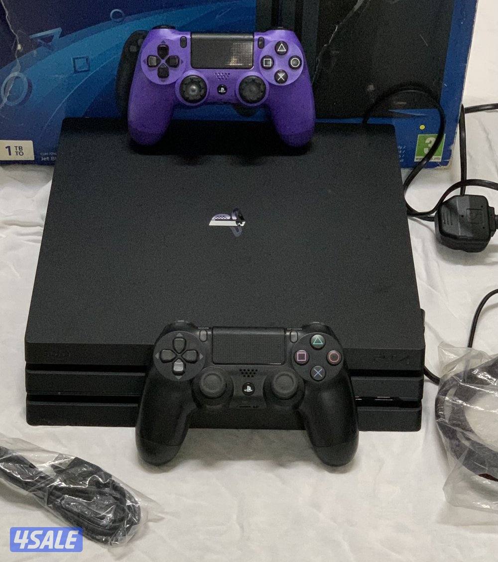 PS4 Pro 1TB + 2 Controllers + Box + 2 thumb grips ( Negotiable )2