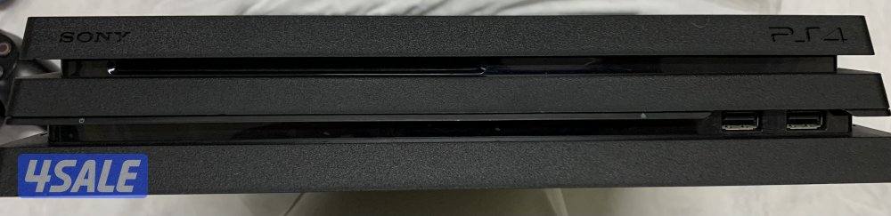 PS4 Pro 1TB + 2 Controllers + Box + 2 thumb grips ( Negotiable )5