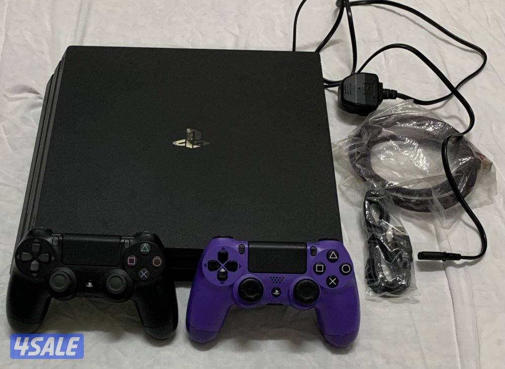 PS4 Pro 1TB + 2 Controllers + Box + 2 thumb grips ( Negotiable )7