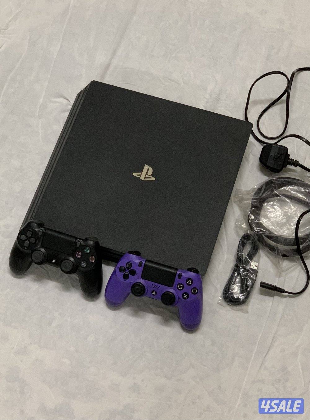 PS4 Pro 1TB + 2 Controllers + Box + 2 thumb grips ( Negotiable )9