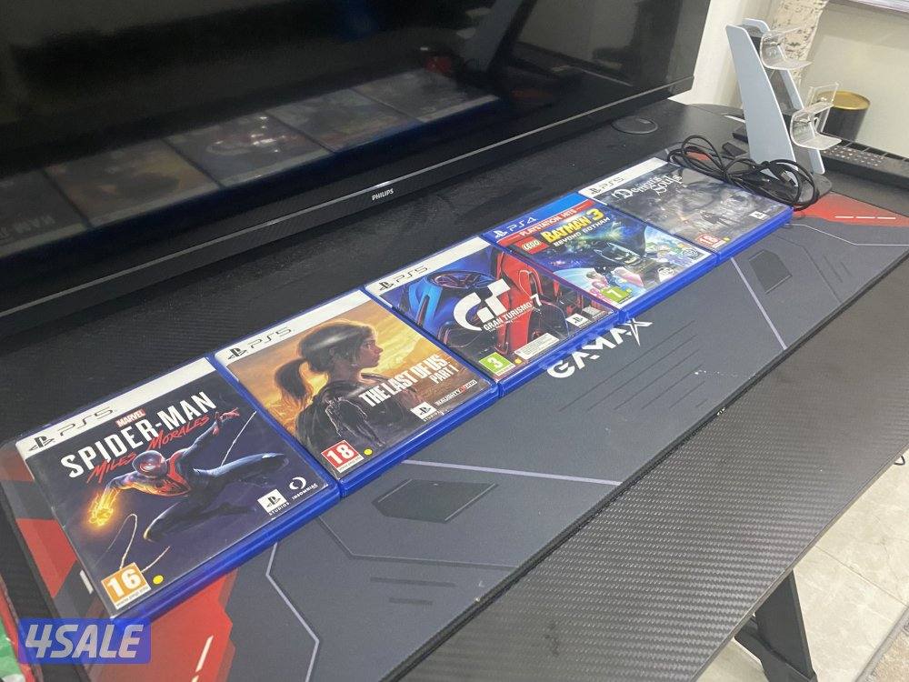 5 cds plus PlayStation controller charger for 2 controllers1