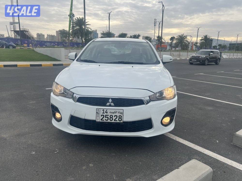 ميتسوبيشي لانسر ٢٠١٦  بحالة ممتازة  بيعة سريعة ٩٥٠. دينار2