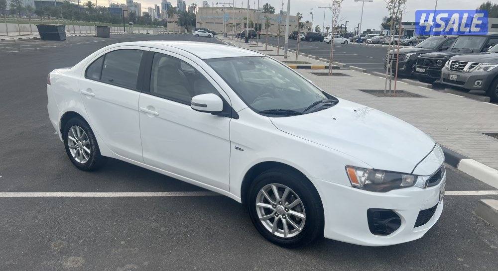 ميتسوبيشي لانسر ٢٠١٦  بحالة ممتازة  بيعة سريعة ٩٥٠. دينار3