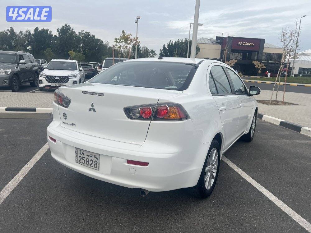 ميتسوبيشي لانسر ٢٠١٦  بحالة ممتازة  بيعة سريعة ٩٥٠. دينار4