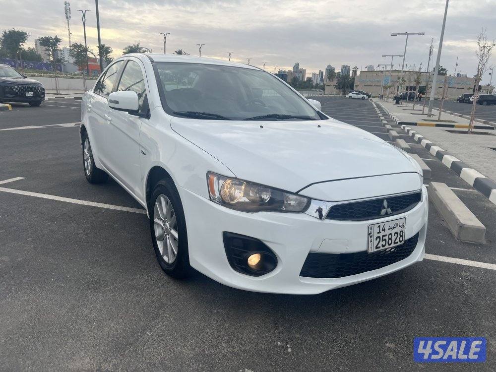ميتسوبيشي لانسر ٢٠١٦  بحالة ممتازة  بيعة سريعة ٩٥٠. دينار1