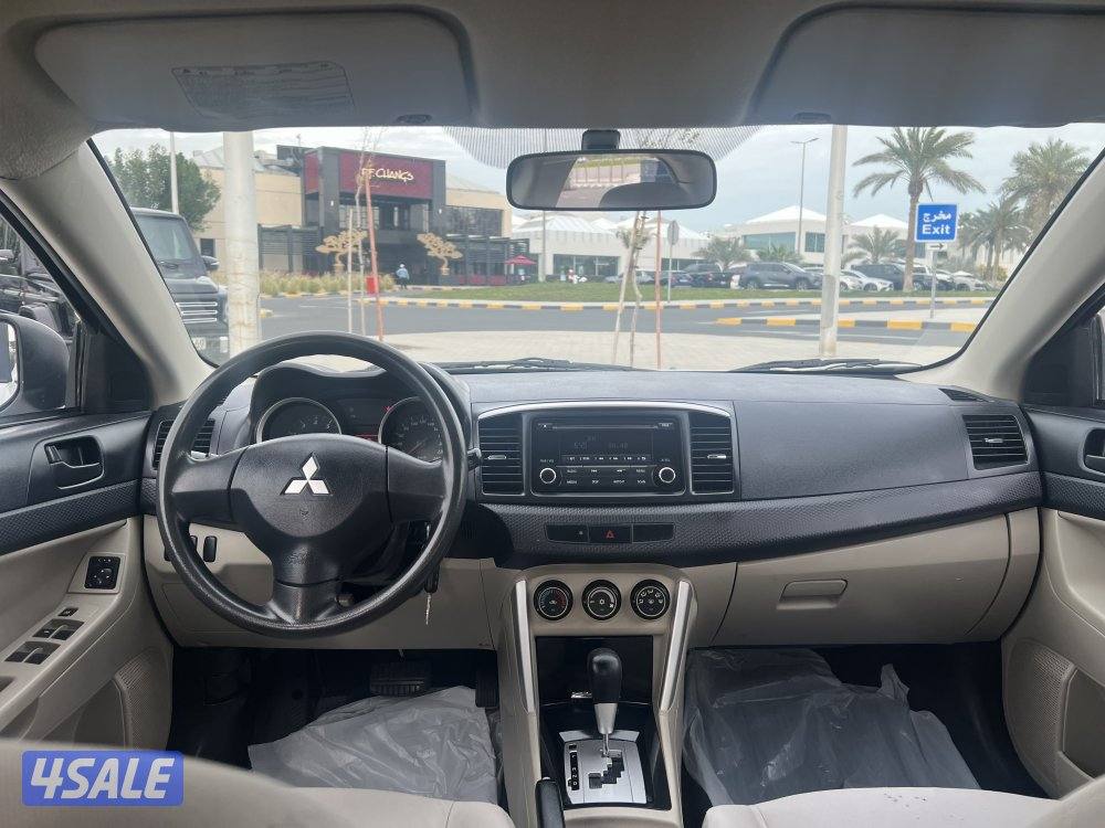 ميتسوبيشي لانسر ٢٠١٦  بحالة ممتازة  بيعة سريعة ٩٥٠. دينار7