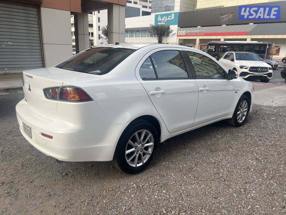 ميتسوبيشي لانسر ٢٠١٦  بحالة ممتازة  بيعة سريعة ٩٥٠. دينار10