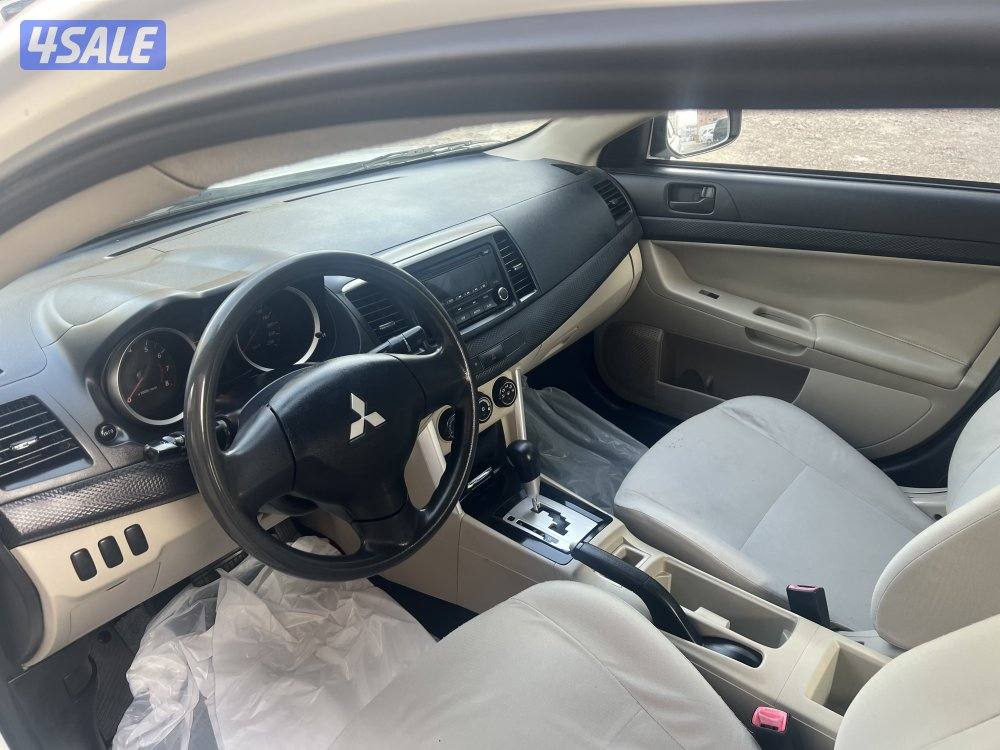 ميتسوبيشي لانسر ٢٠١٦  بحالة ممتازة  بيعة سريعة ٩٥٠. دينار11