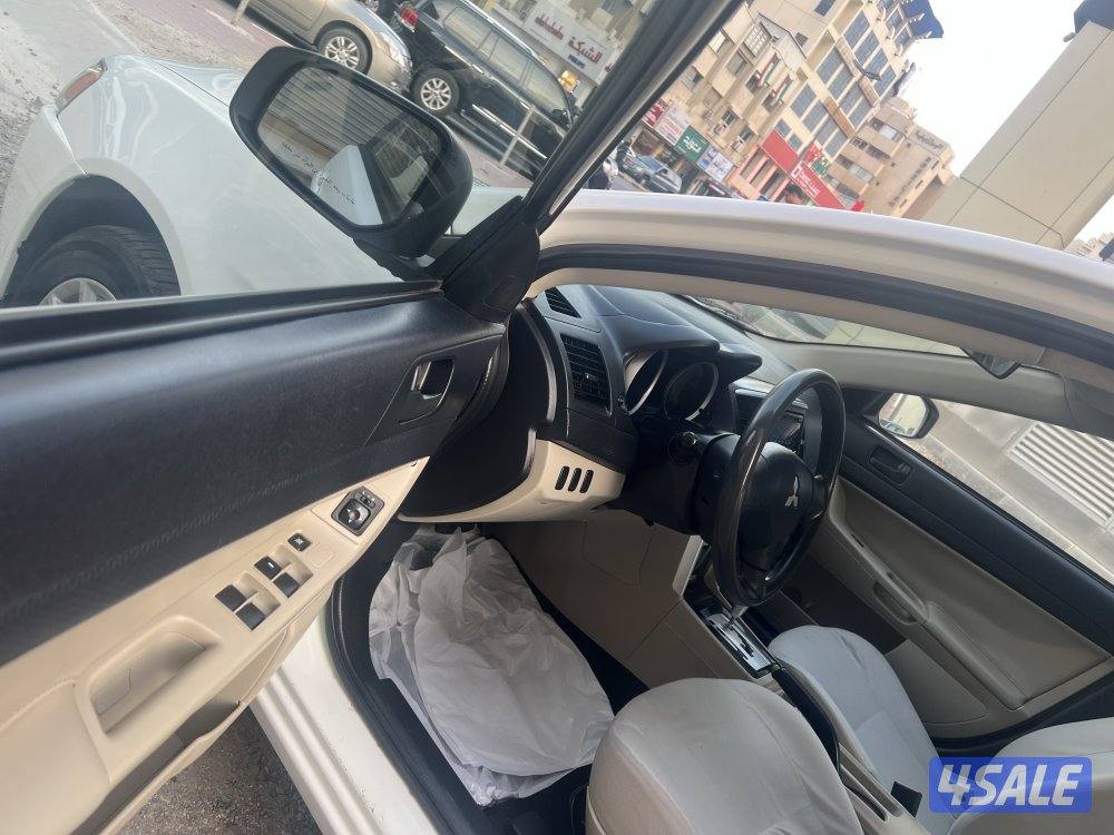 ميتسوبيشي لانسر ٢٠١٦  بحالة ممتازة  بيعة سريعة ٩٥٠. دينار14