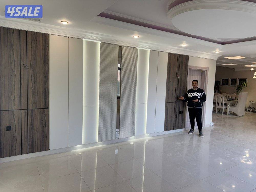 تنفيذ اعمال الديكور والصبغ الداخلي وورق جدران ديكورات خشبيه7