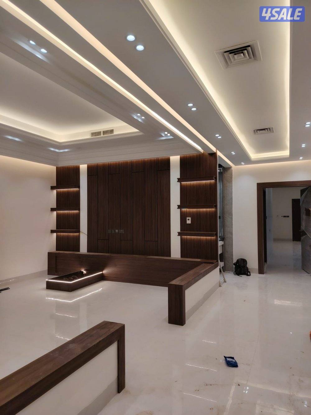 تنفيذ اعمال الديكور والصبغ الداخلي وورق جدران ديكورات خشبيه15