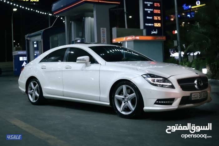 مرسيدس cls 350 اللون ابيض فل كامل المواصفات داخلية حمراء0