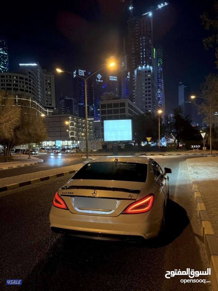 مرسيدس cls 350 اللون ابيض فل كامل المواصفات داخلية حمراء3