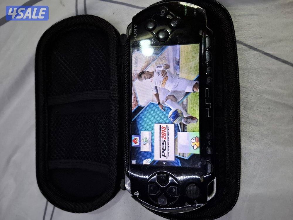 PSP SONY P1000 MODEL.BLACK COLOR 8GB SDCARD WITH 50GAMES0